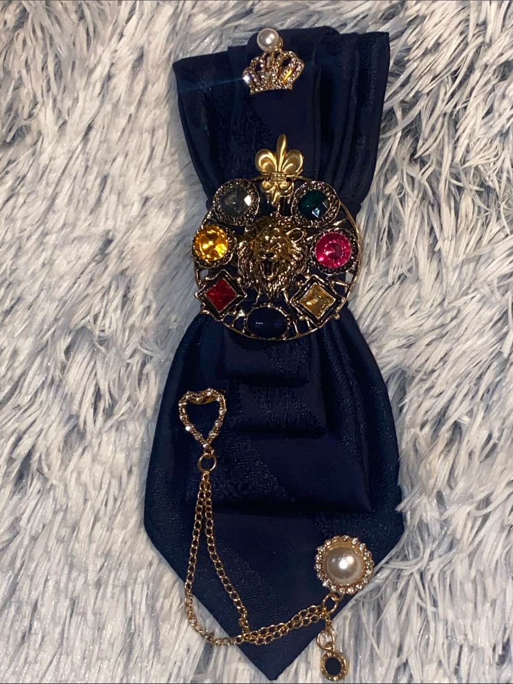 TIE BROOCHES